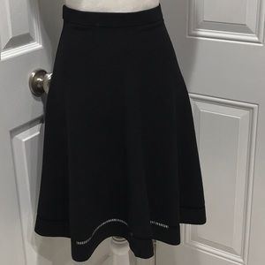 🌹Woman’s Black A-Line Stretchy Adorned Hem Jersey  Skirt, S-M